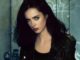 Krysten Ritter caracterizada como Jessica Jones no MCU, em cena da série da Marvel